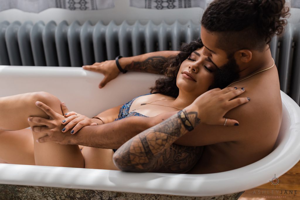 Couples boudoir photography bath scene