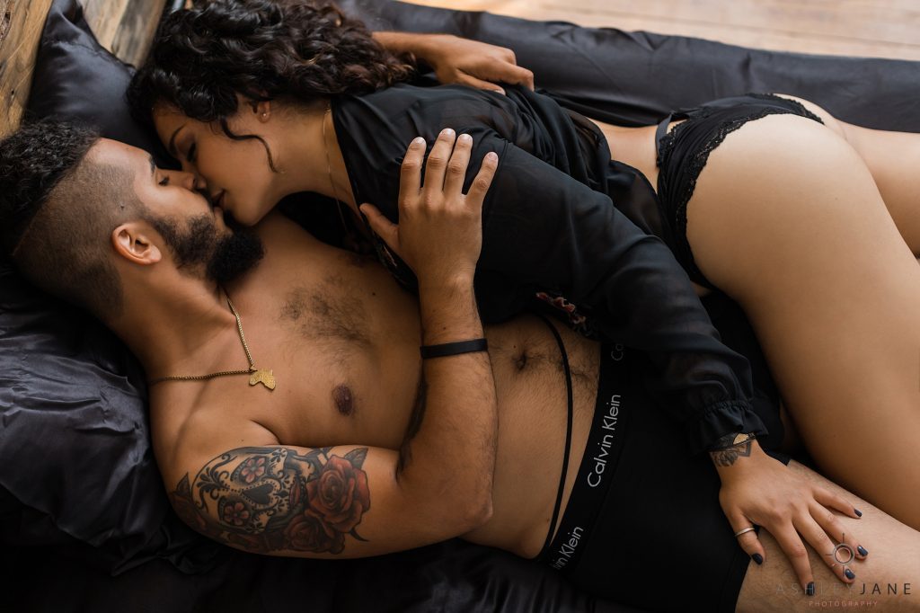 Intimate boudoir image in bed