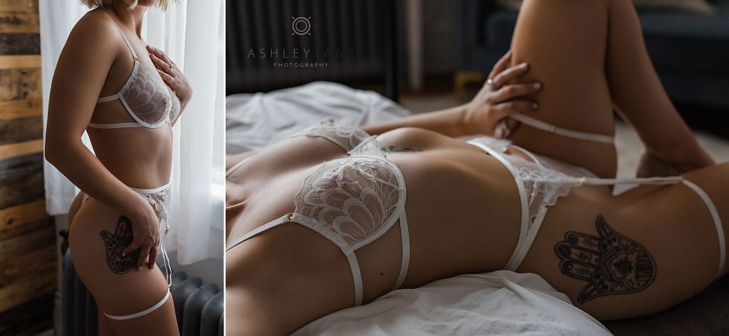 Close-up body shots of boudoir model wearing lacy white lingerie. Tattoo on hip.